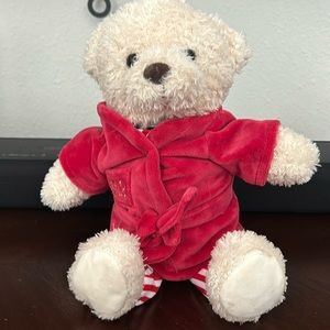 Teddy bear with a jar in it